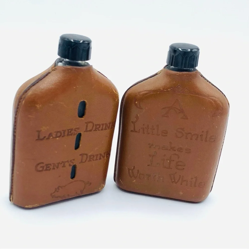 Pair Of Vintage Souvenir Leather Wrapped Glass Whiskey Flasks